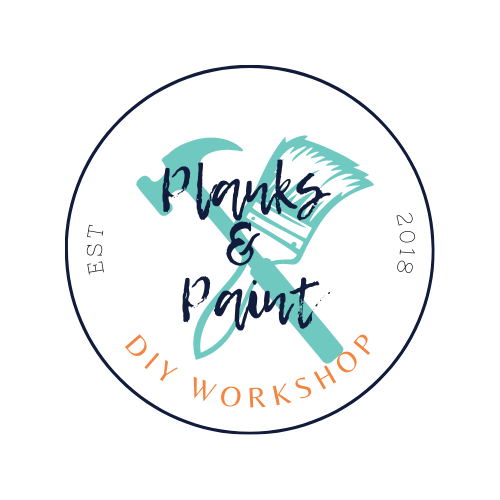 Logo for Planks & Paint DIY Workshop, established in 2018 in Loveland, Colorado. The design features a teal hammer and paintbrush crossed in the center with the text "Planks & Paint" and "DIY Workshop" in circular arrangement. Perfect for new homes in Centerra!